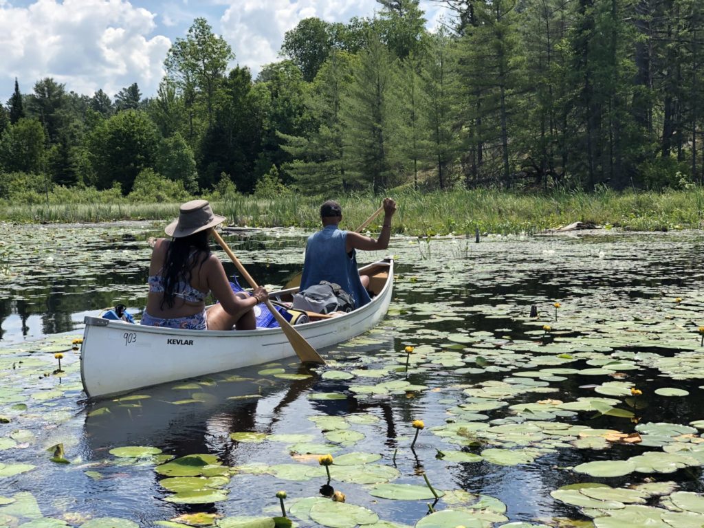 canoe paddling lake backcountry camping